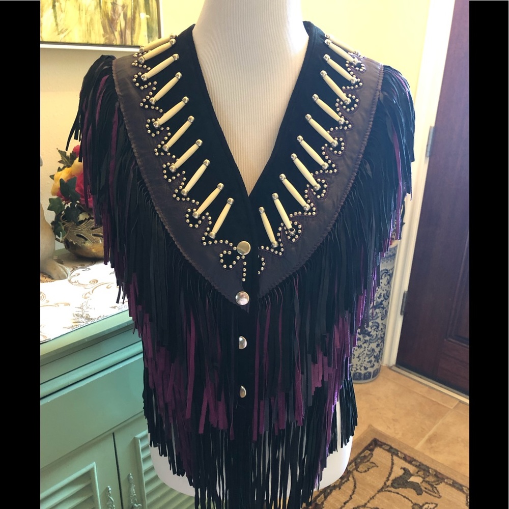 Leather Gallery Vintage fringe vest with studs and bone accents